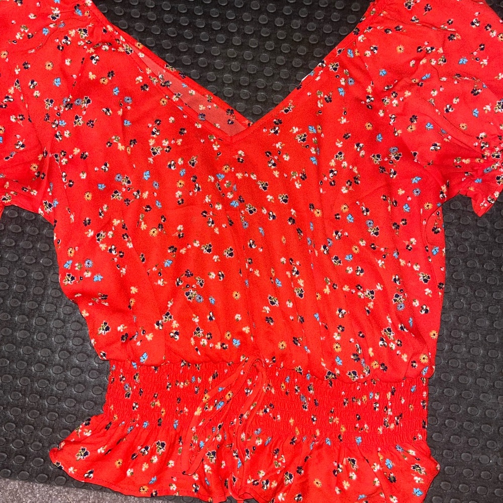 Red blouse w/ flowers